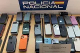 Tânăr român, prins în Barcelona cu 139 de telefoane furate. Voia să le transporte în România